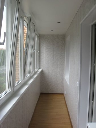 Отделка балкона МДФ панелями фото